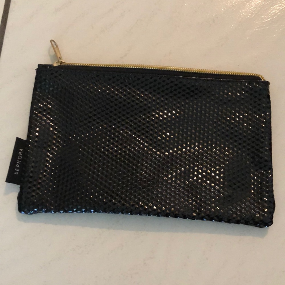 Makeup bag or purse.